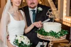 Bride and Goom Cut the Cake